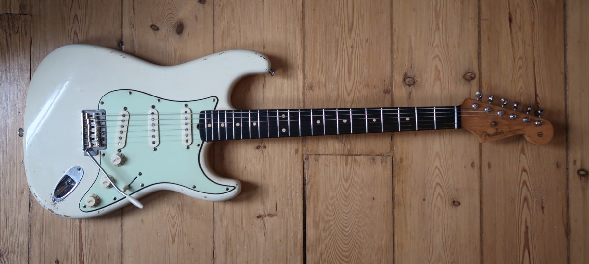 Here s what I did with my Christmas holiday aged Olympic White nitro 60s Strat build Telecaster Guitar Forum
