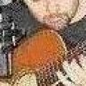 John E